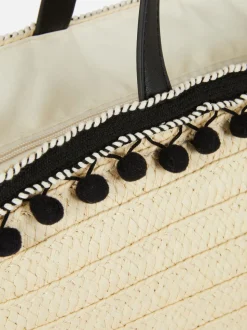 Słomkowa torba typu bucket z pomponikami