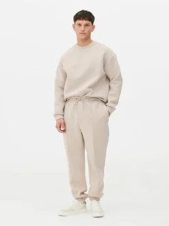 Spodnie dresowe ze ściągaczami i zaszewkami Kem