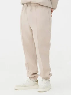 Spodnie dresowe ze ściągaczami i zaszewkami Kem