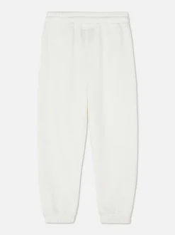 Spodnie dresowe ze ściągaczami i motywem Disneya