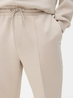 Spodnie dresowe ze ściągaczami i zaszewkami Kem