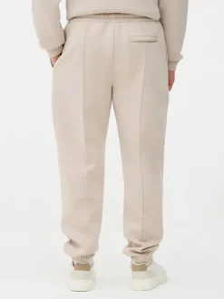 Spodnie dresowe ze ściągaczami i zaszewkami Kem