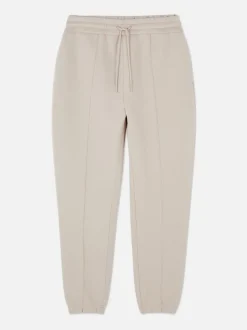 Spodnie dresowe ze ściągaczami i zaszewkami Kem