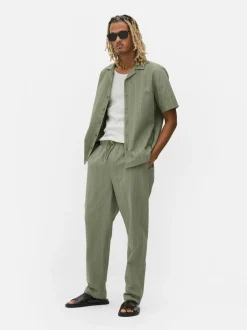 Spodnie w paski z tkaniny seersucker