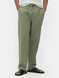 Spodnie w paski z tkaniny seersucker