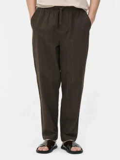 Spodnie w paski z tkaniny seersucker