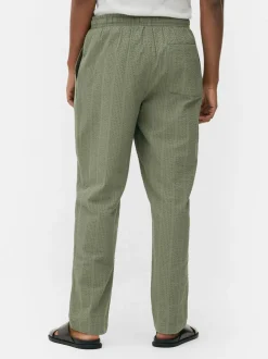 Spodnie w paski z tkaniny seersucker