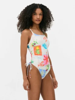 Strój kąpielowy z marszczeniami i wiązaniem z boku