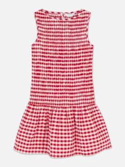 Sukienka w kratkę z marszczeniami i niskim stanem