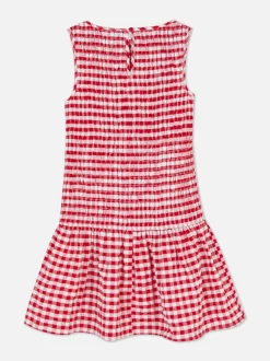 Sukienka w kratkę z marszczeniami i niskim stanem