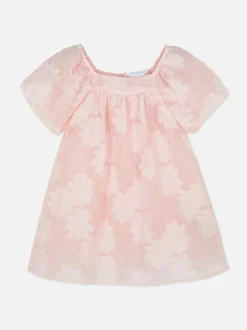 Sukienka z bufiastymi rękawami w kwiaty