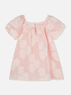 Sukienka z bufiastymi rękawami w kwiaty