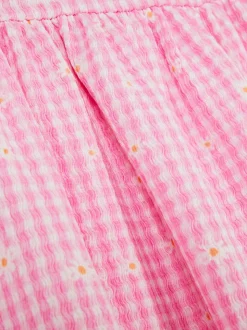 Sukienka z falbanką w kratkę vichy z motywem kwiatów