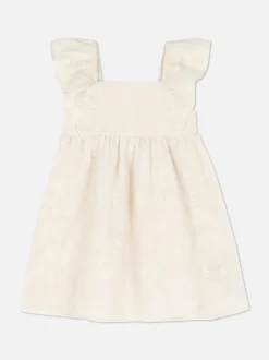 Sukienka z haftem i falbankami