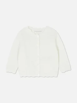 Sweter rozpinany z muszelkowym wykończeniem