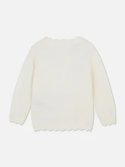 Sweter rozpinany z muszelkowym obszyciem