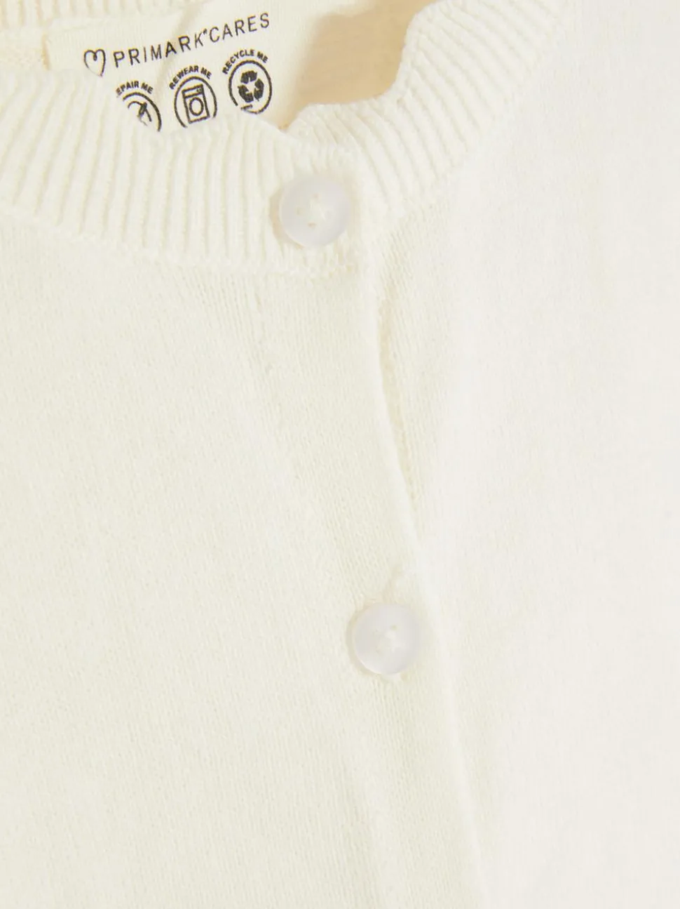 Sweter rozpinany z muszelkowym obszyciem