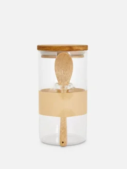 Szklany pojemnik z łyżką