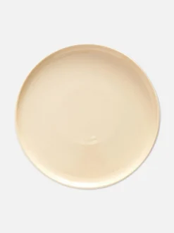 Szkliwiony talerz obiadowy z nakrapianym wzorem