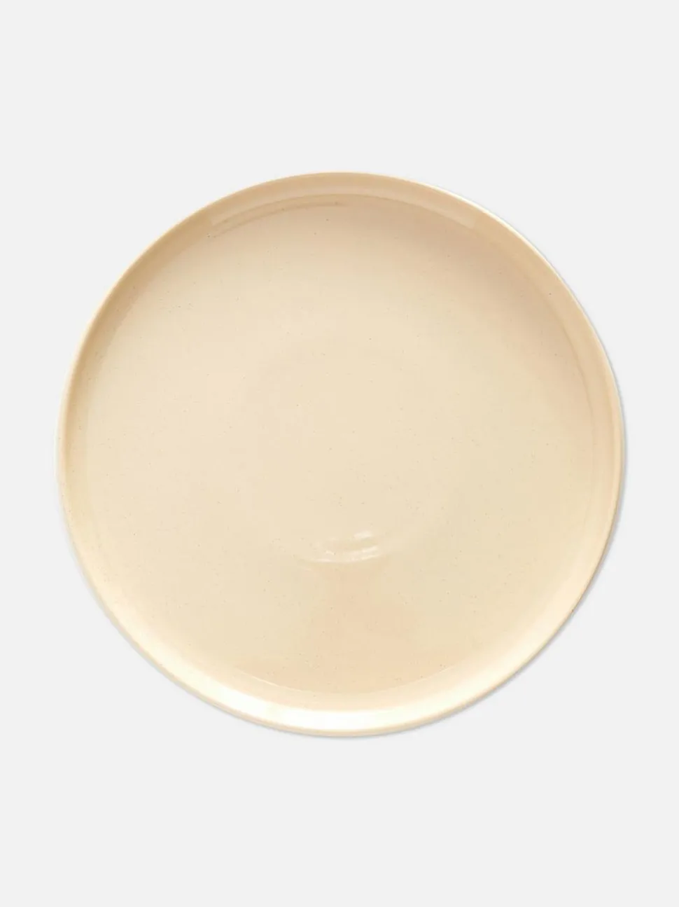 Szkliwiony talerz obiadowy z nakrapianym wzorem