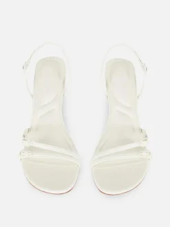 Szpilki z tylnym paskiem i obcasem typu kaczuszka