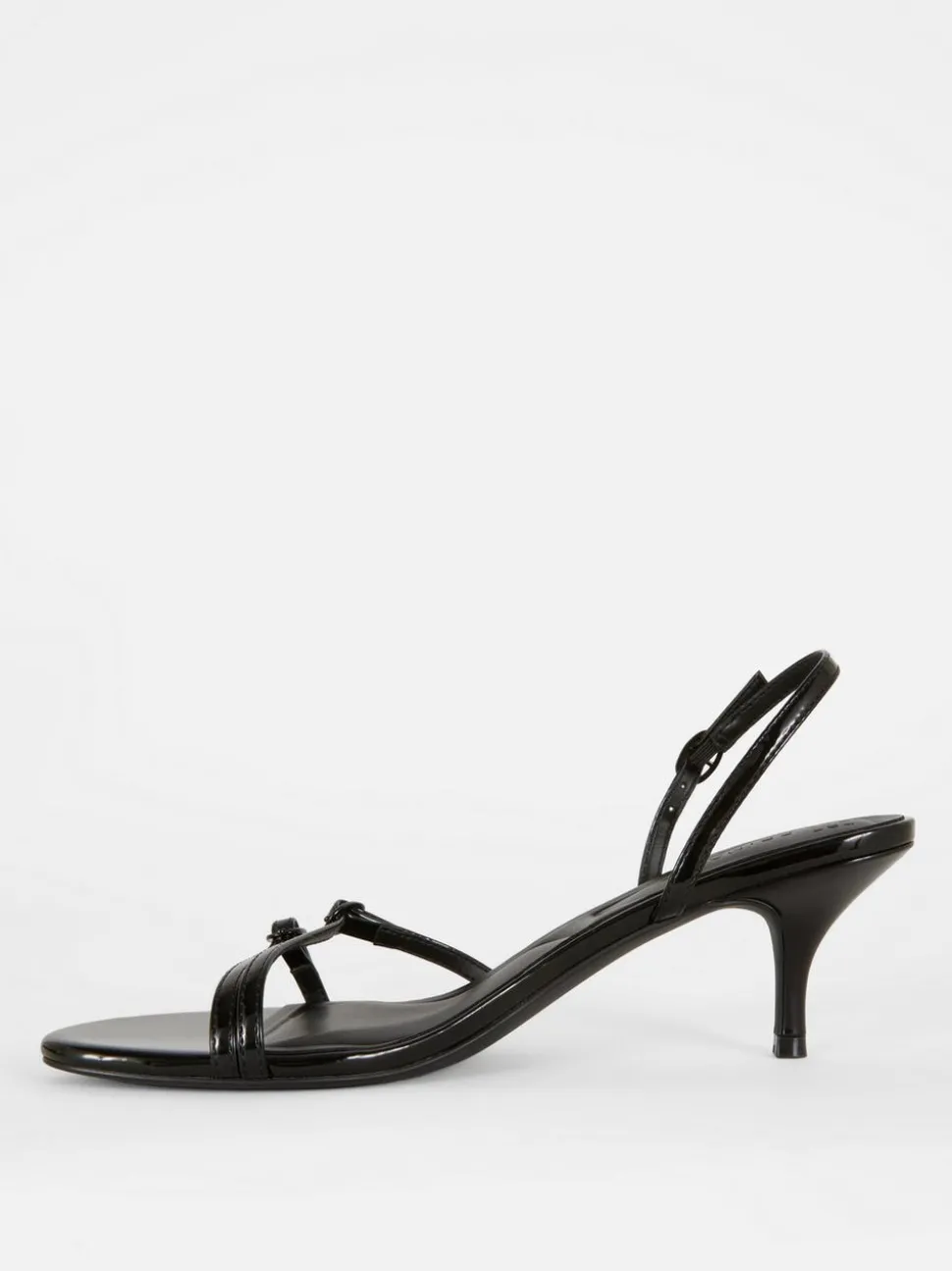 Szpilki z tylnym paskiem i obcasem typu kaczuszka