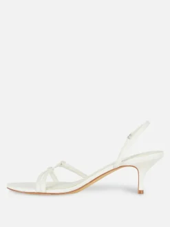 Szpilki z tylnym paskiem i obcasem typu kaczuszka