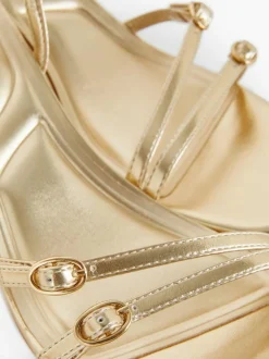 Szpilki z tylnym paskiem i obcasem typu kaczuszka