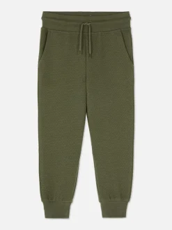 Teksturowane spodnie dresowe ściągane sznurkiem