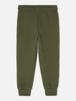 Teksturowane spodnie dresowe ściągane sznurkiem