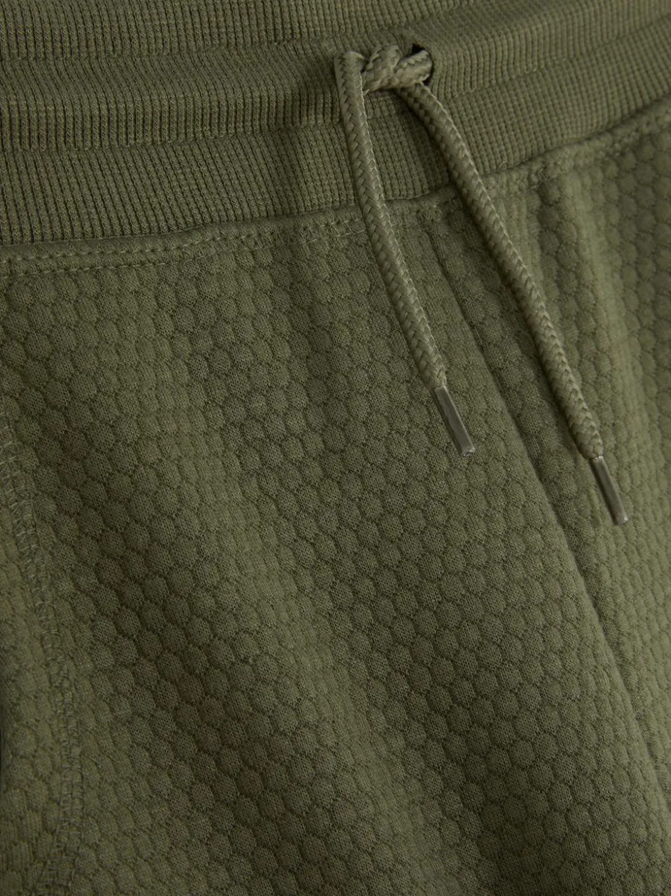 Teksturowane spodnie dresowe ściągane sznurkiem