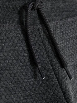 Teksturowane spodnie dresowe z geometrycznym wzorem