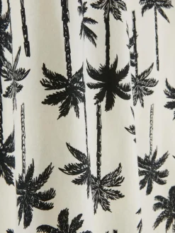 T-shirt z nadrukiem w palmy