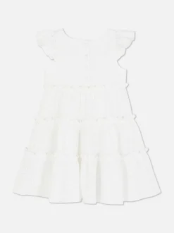 Warstwowa sukienka z haftem