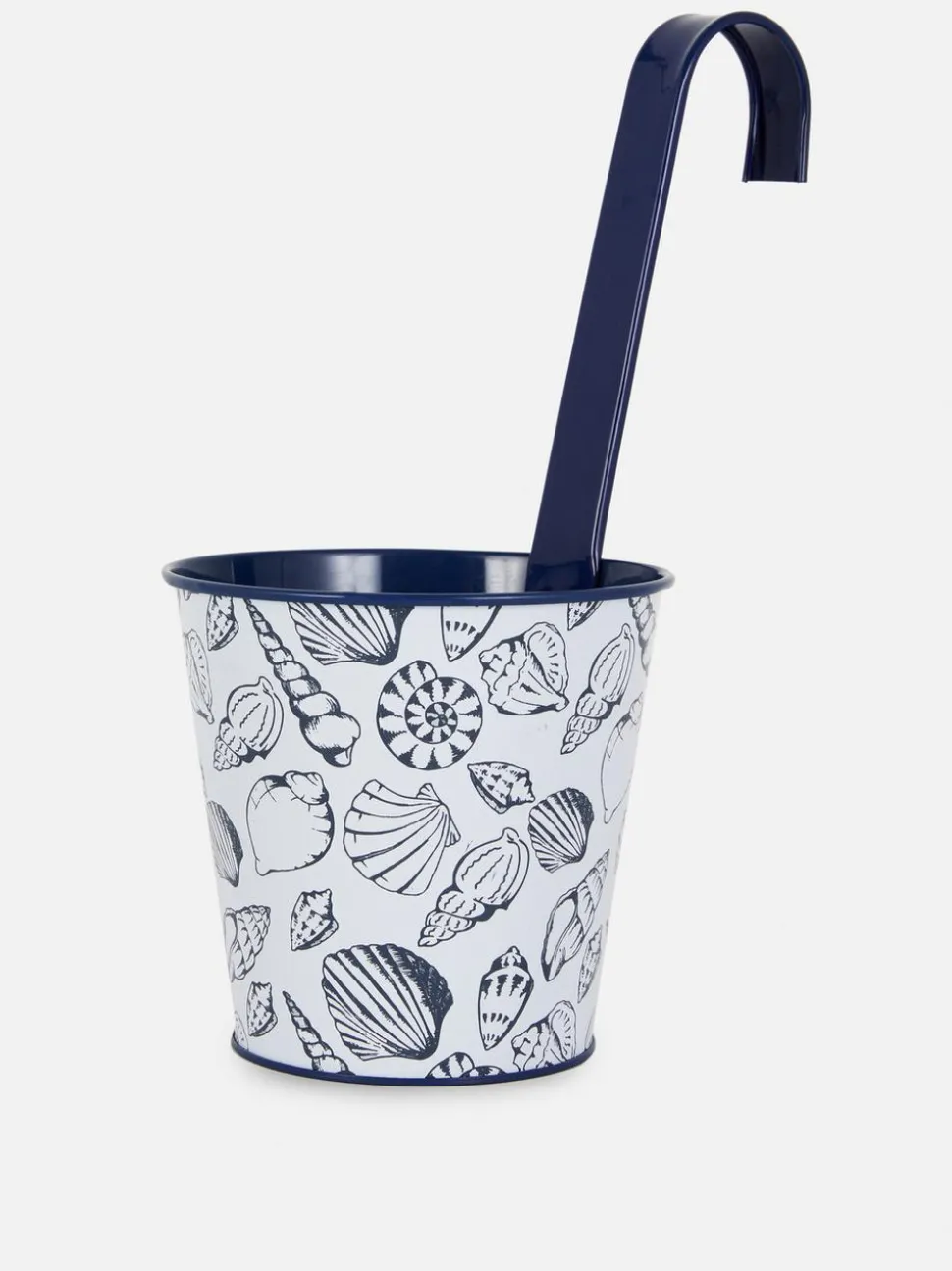 Wisząca metalowa doniczka ze wzorem w kwiaty