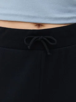 Wąskie spodnie dresowe ściągane sznurkiem