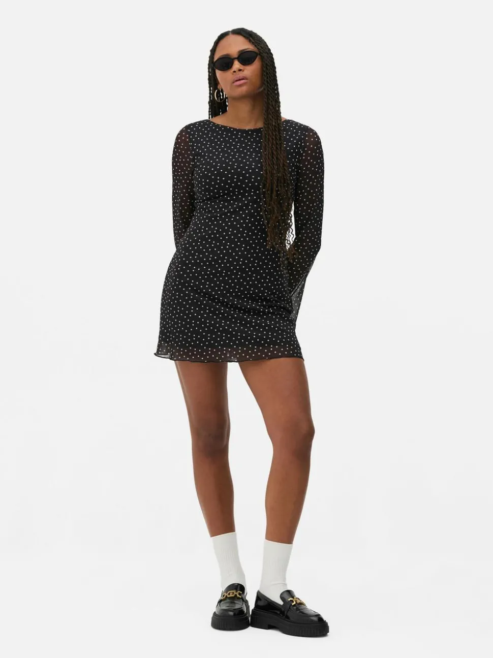 Wzorzysta siateczkowa sukienka mini z dżerseju