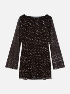 Wzorzysta siateczkowa sukienka mini z dżerseju