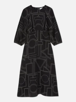 Wzorzysta sukienka midi