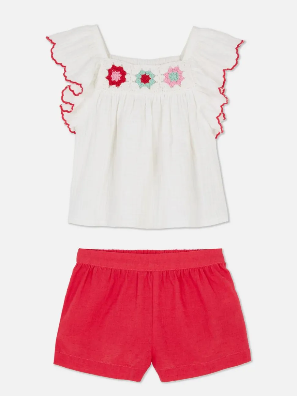 Zestaw z szydełkową bluzką i szortami