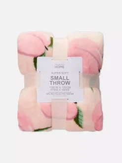 Bardzo miękka narzuta z nadrukiem w brzoskwinie