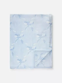 Bardzo miękka narzuta ze wzorem w kokardy