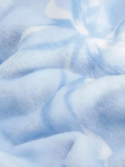 Bardzo miękka narzuta ze wzorem w kokardy