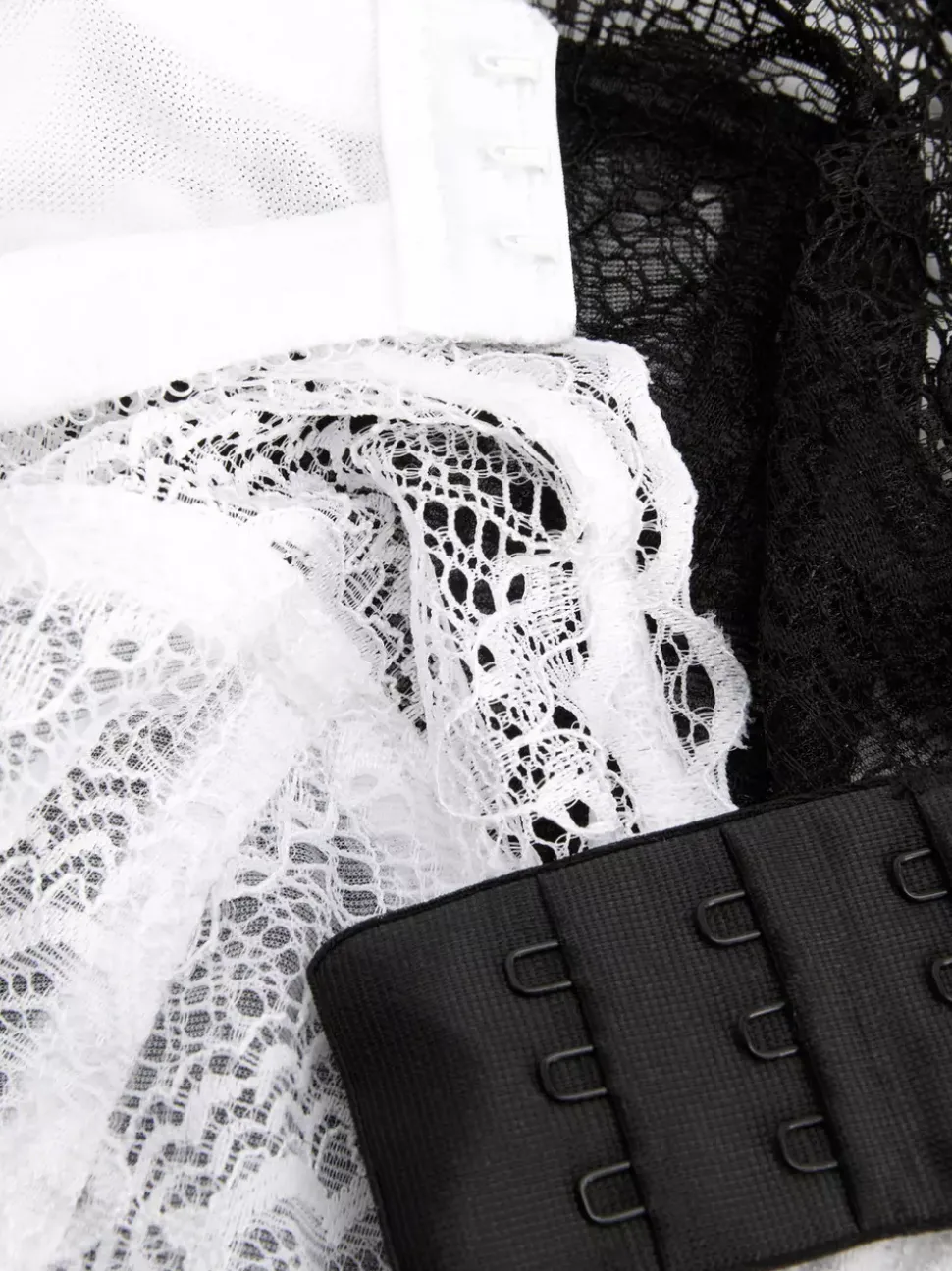 Biustonosze nieusztywniane w rozmiarze D–H, 2 szt.