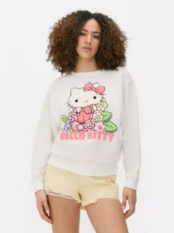 Bluza w kwiaty z napisem Hello Kitty