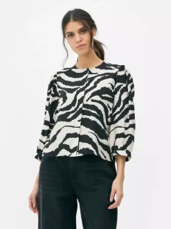 Bluzka w zebrę z bufiastym rękawem Paula Echevarría