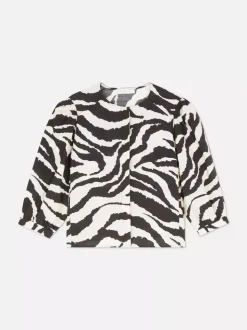 Bluzka w zebrę z bufiastym rękawem Paula Echevarría