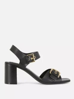 Buty na obcasie klockowym z ozdobnymi oczkami