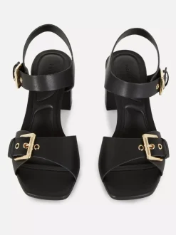 Buty na obcasie klockowym z ozdobnymi oczkami