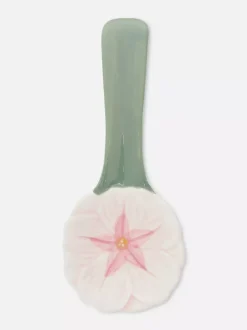 Ceramiczna podstawka pod łyżkę z motywem kwiatka